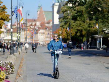 city square, e-scooter, man