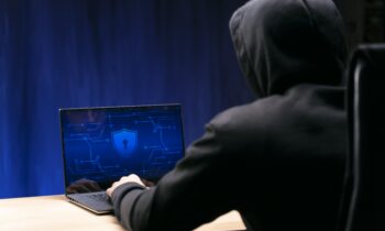 close-up-programmer-typing-laptop